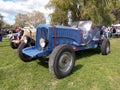 Old 1920s Buick bucket racer speedster on the lawn. Nature, grass, trees. Classic car show. Royalty Free Stock Photo