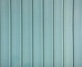 Old blue siding texture. Vintage panel background