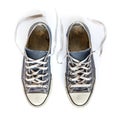 Old blue sneakers isolated on white background Royalty Free Stock Photo