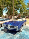 Old blue sport 1969 Pontiac GTO convertible in a park. Classic l Royalty Free Stock Photo