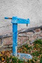 Old blue street water pump Royalty Free Stock Photo