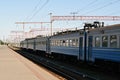 Old blue train on the tracks Royalty Free Stock Photo