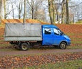 Old blue truck in an autumn garden Royalty Free Stock Photo