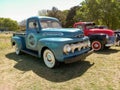 old blue utility 1951 Ford F 1 pickup truck in the countryside. Autoclasica 2022 classic car show Royalty Free Stock Photo