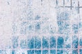 Old blue-white tile on the wall, rustic background Royalty Free Stock Photo