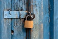 Old door locked with new padlock Royalty Free Stock Photo