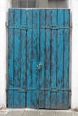 Old blue wooden door locked old door padlock Royalty Free Stock Photo