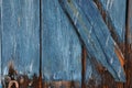 Old blue wooden door in Loutro, Crete Royalty Free Stock Photo