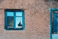 Old blue wooden door and window, cement wall in a country house Royalty Free Stock Photo