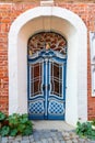Old blue wooden front door in house. Luneburg. Germany