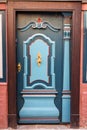 Old blue wooden front door in house. Luneburg. Germany