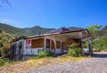 Old Boarded Up Store Front Building In Disrepair