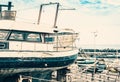 Old boat in Acitrezza harbor with fisher boats next to Cyclops islands, Catania, Sicily, Italy Royalty Free Stock Photo