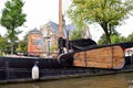 Old boat in a canal in Amsterdam Royalty Free Stock Photo