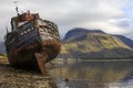 Old Boat of Caol and Ben Nevis in Scotland, UK Royalty Free Stock Photo