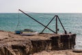 Old Boat and Crane in Cornwall Royalty Free Stock Photo