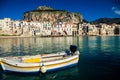 Old boat drifting in a Cefalu harbor Royalty Free Stock Photo