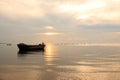 Old boat in front of sunset background Royalty Free Stock Photo