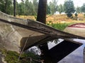 Old boat full of water next to a lake Royalty Free Stock Photo