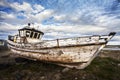 Old Boat on Junk Yard. Royalty Free Stock Photo
