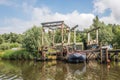 Old boat lifts in the water Royalty Free Stock Photo