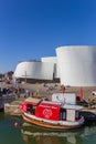 Old boat and Ozeaneum sea museum in Stralsund