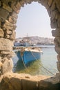 Old boat at Paros island in Greece. View from inside the Kastelli castle. Royalty Free Stock Photo
