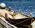 Old boat on pier, norway fjord Royalty Free Stock Photo