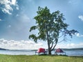 Old boat for rent  the old iron holder on the river bank Royalty Free Stock Photo