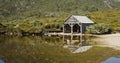 the old boat shed at dove lake on a calm summer morning at cradle mountain national park Royalty Free Stock Photo