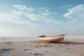 an old boat sits on the sand in the middle of the desert Royalty Free Stock Photo