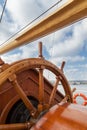 Old boat steering wheel from wood Royalty Free Stock Photo