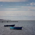 Old boats in choppy waters