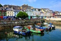 Old boats and colorful harbor buildings, Cobh, County Cork, Ireland