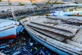 Old boats moored in a dirty harbour. Pollution of river, sea, ocean water with plastics and other garbage. Environmental pollution Royalty Free Stock Photo