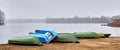 Old boats are overturned on the shore. Boat station