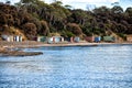 Old boatsheds on the shoreline at Opposum Bay along the Derwent River Royalty Free Stock Photo