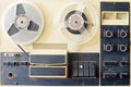Old bobbin tape recorder on magnetic tape Royalty Free Stock Photo