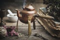 Old Boiling Teapot, Dry Coneflowers, Old Books And Medicinal Herbs