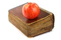 Old book with apple Royalty Free Stock Photo