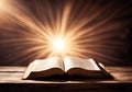 Old book or bible with magic glowing lights. Royalty Free Stock Photo