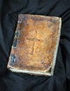 Old book on black background. Ancient christian Bible. Antique H Royalty Free Stock Photo