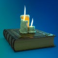 Old book and candles on blue background Royalty Free Stock Photo