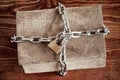 Old book with chain and padlock