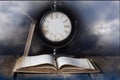 Old Book and Clock without Hands Royalty Free Stock Photo