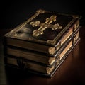 an old book with a cross on it sitting on a table with a black back ground and a black background with a light shining on it Royalty Free Stock Photo