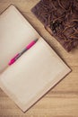 Old book and diary on wooden table Royalty Free Stock Photo