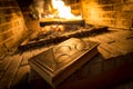 Old book beside burning fireplace