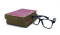 Old book and glasses on a white Royalty Free Stock Photo