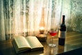 Old book and a kerosene lamp Royalty Free Stock Photo